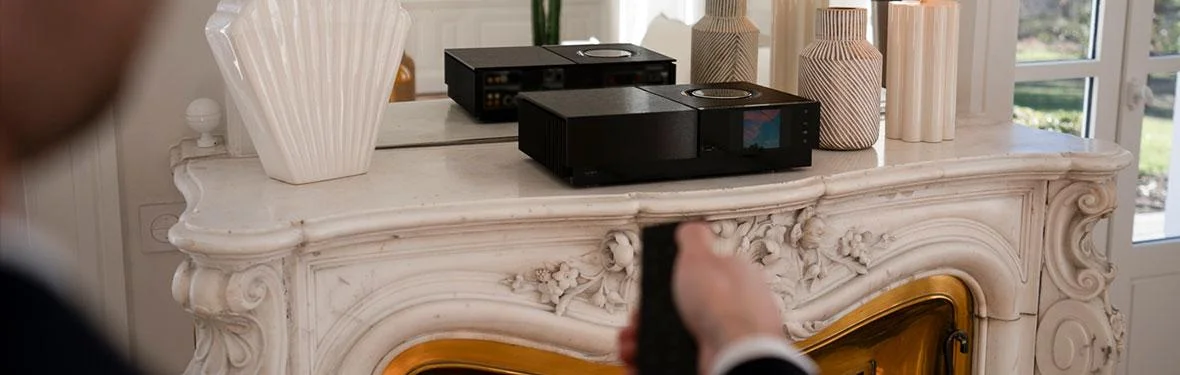 Naim Uniti Nova Power Edition position on Classic French fireplace in a lifestyle photograph.