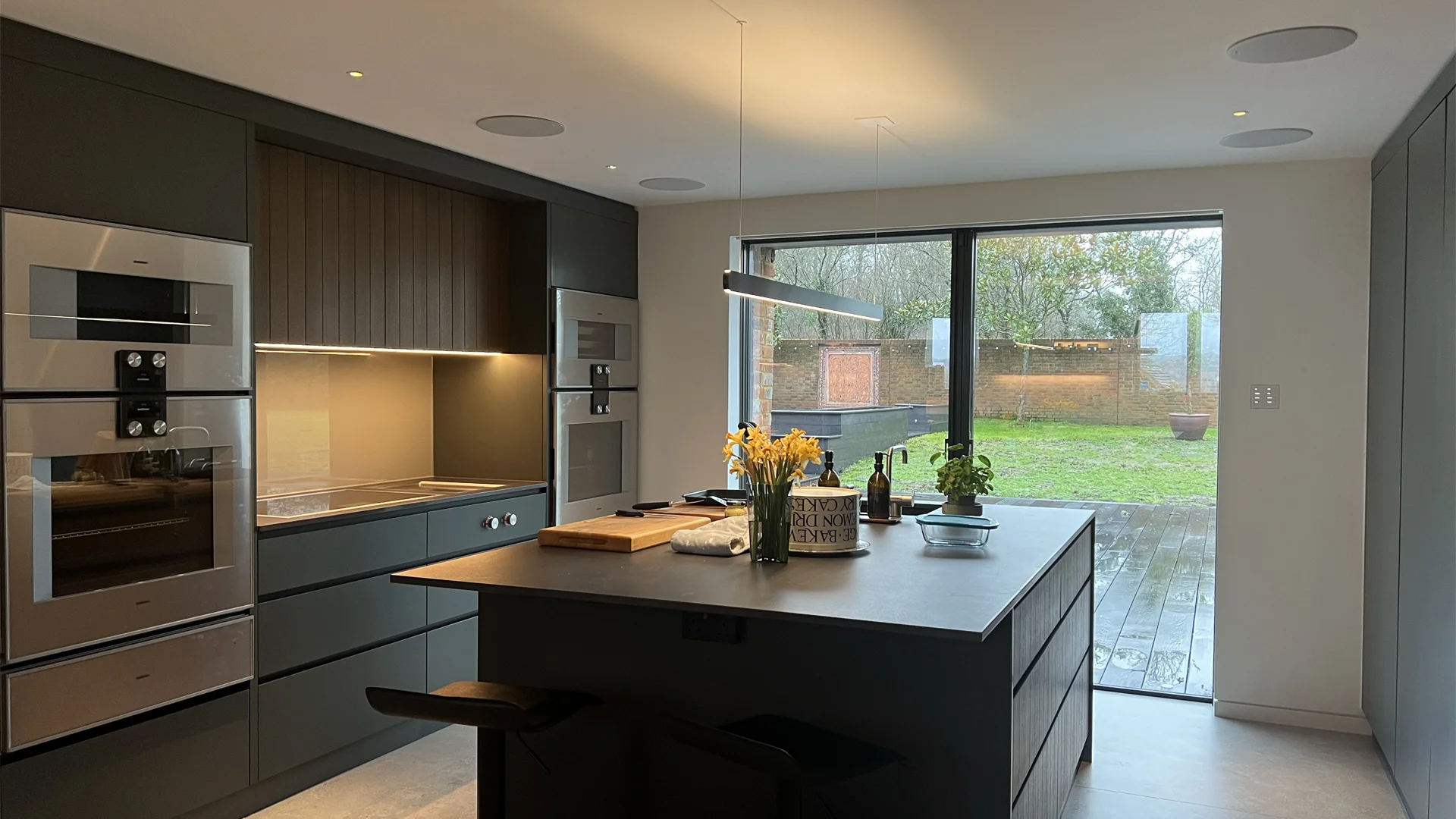 High-End Kitchen with ceiling speakers installed for multi-room audio