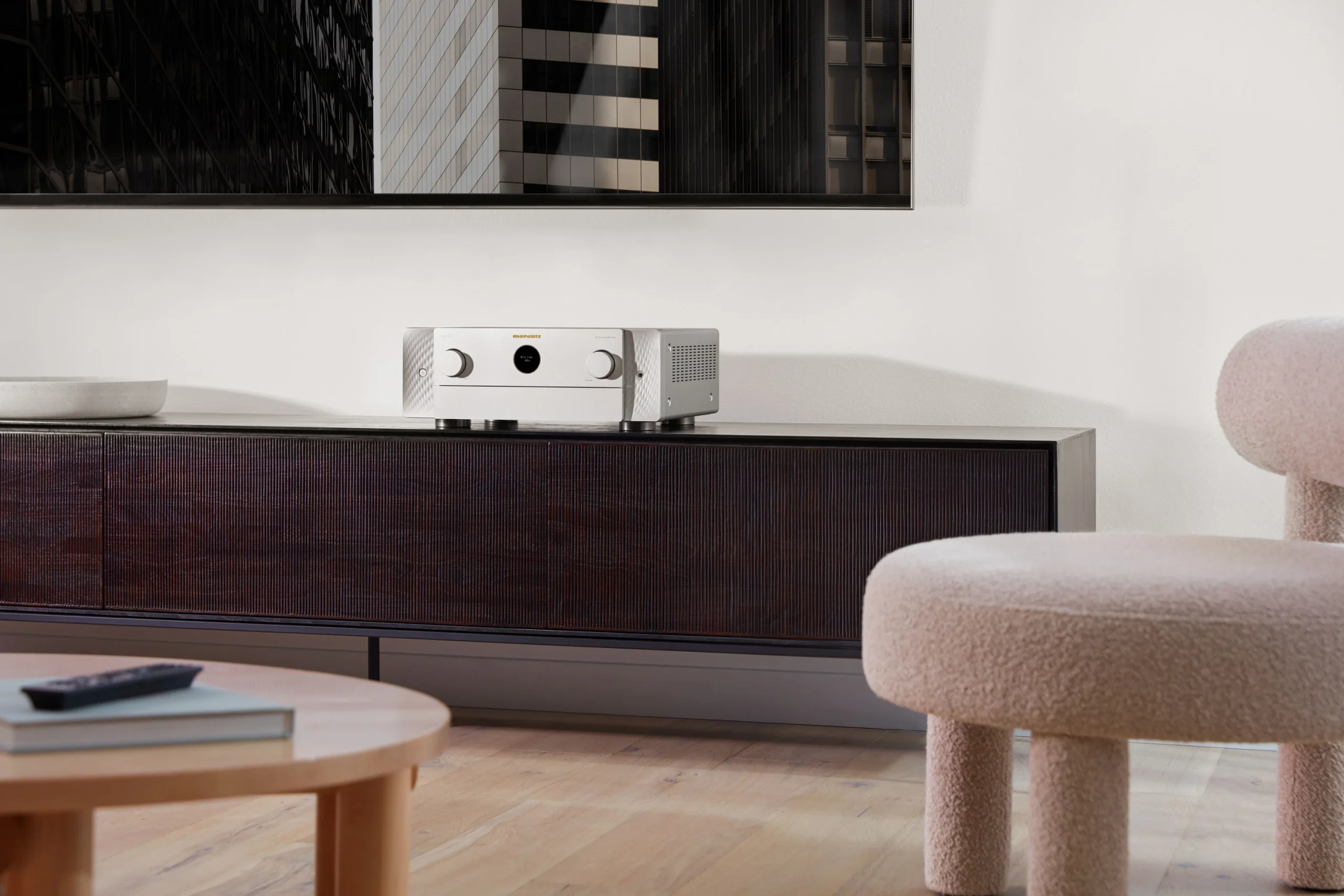 Marantz CINEMA 50 Lifestyle image silver gold on sideboard