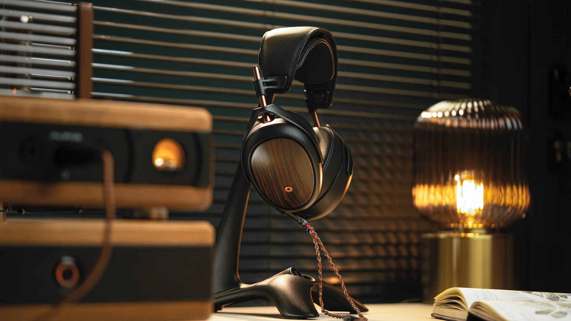 Meze LIRIC 2nd Generation desktop lifestyle image with warm lamp