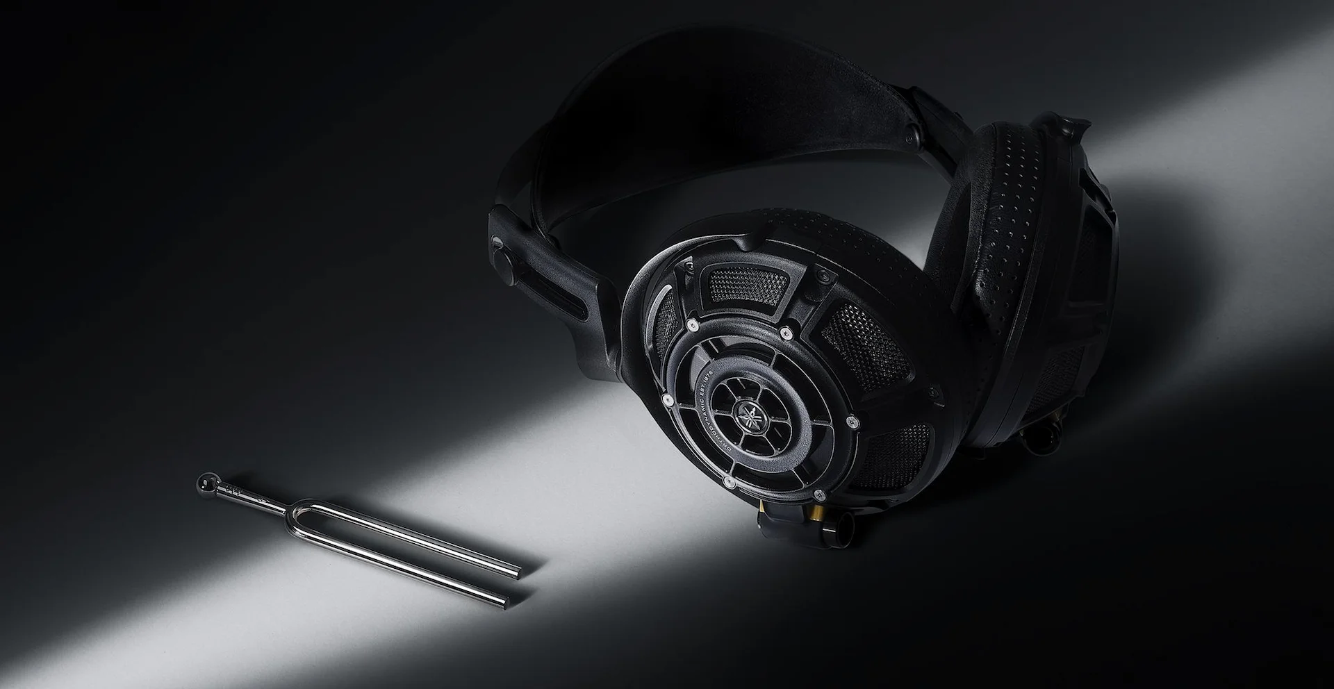 Yamaha YH500 Headphones and Tuning Fork representing tuned to perfection